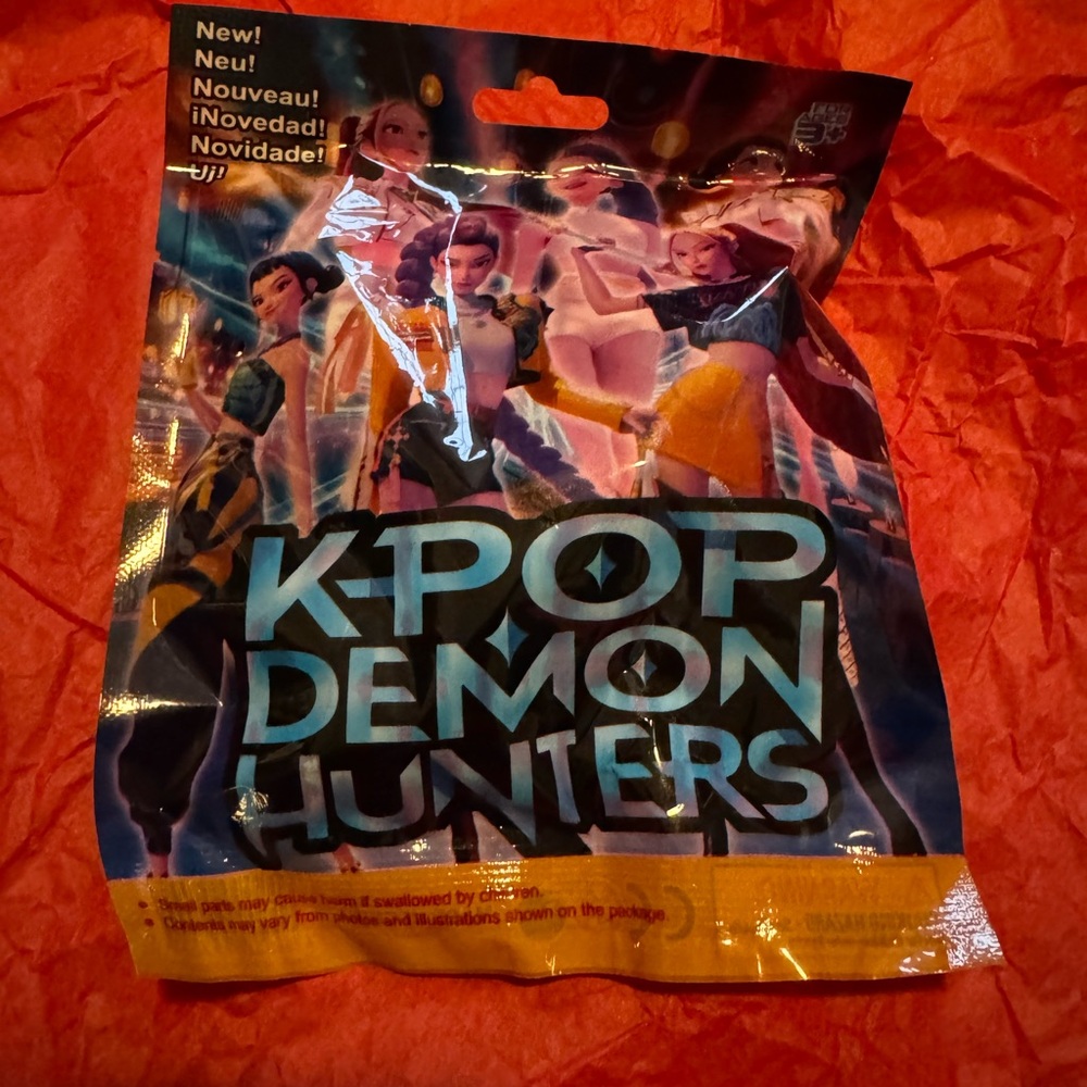 K-Pop Demon Hunters Collectible Bag. One mystery figurine inside.